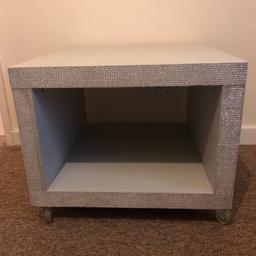 Painted pale grey with diamanté edging. Table is on wheels. The dimensions are 55x55cm and 45cm tall. Buyer will have to collect from park barn Guildford