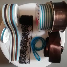 various lengths of satin, lace and other trims and ribbons