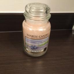 Large Yankee candle, the colour of the candle has faded but this doesn’t effect the scent. Collection only.