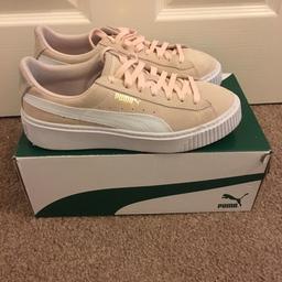 Good condition puma suede light pink trainers in uk size 5. Comes with original box.