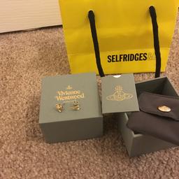 Brand new never been worn Gold small Vivienne Westwood stud earrings. Comes with original box and pouch as seen in picture. Boyfriend bought the wrong ones but couldn't return due to them being earrings.