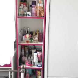 I have a dressing table here half of the top lifts up into a mirror and has storage compartment and one draw on the left. This comes with the stall and I also have the book shelve which I used to hold all my perfumes and things. All perfect condition I’m just buying new furniture.  Need gone ASAP buyer collects. £40 for both or Nearest offer
