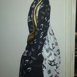 BLACK AND WHITE LADIES LONG SCARF BRAND NEW NEVER BEEN USED THERE ARE 2 ONE BLACK AND ONE WHITE PRICE IS FOR ONE