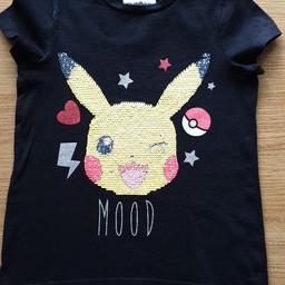Black interactive sequin t-shirt with Pokemon for child age 4-5 years. 

In very used but very good condition. 

Washed in non-bio detergent and from a smoke free and pet free home.