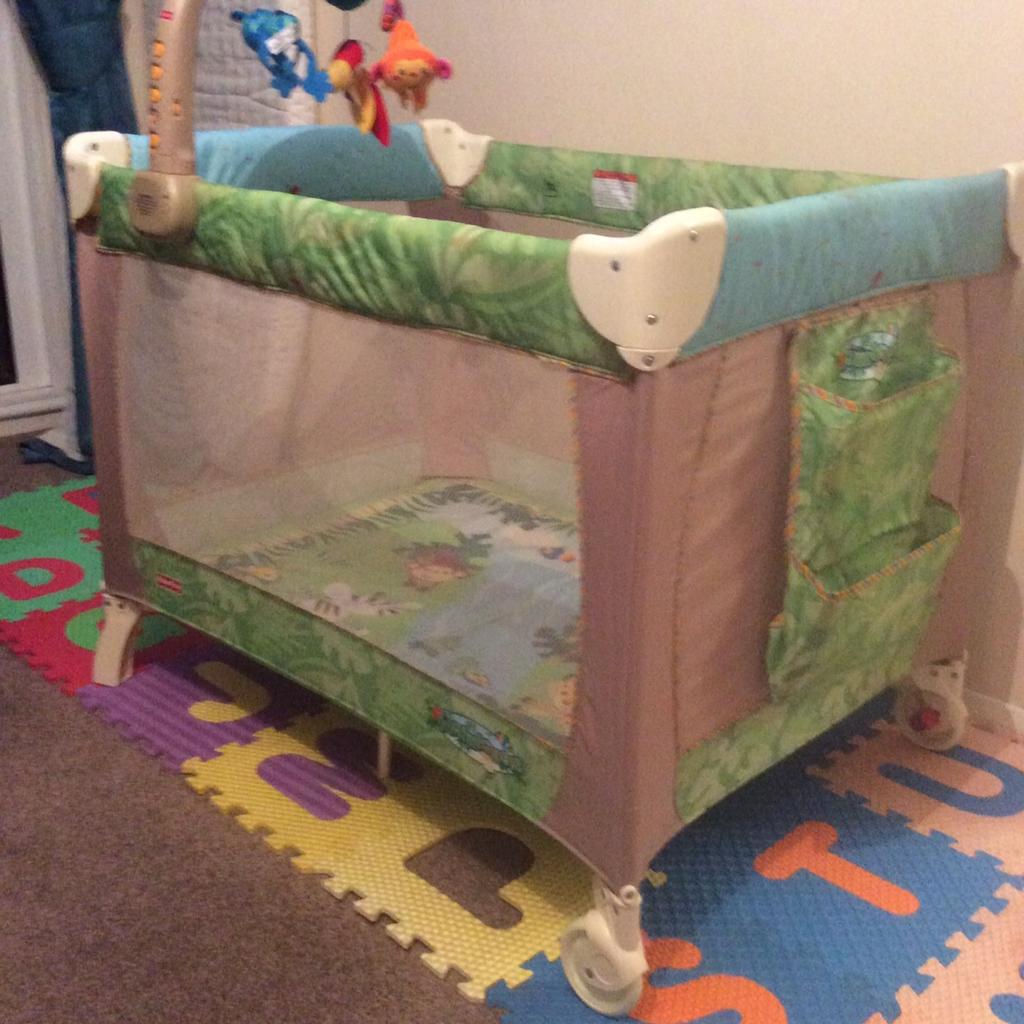 Fisher price best sale rainforest travel cot