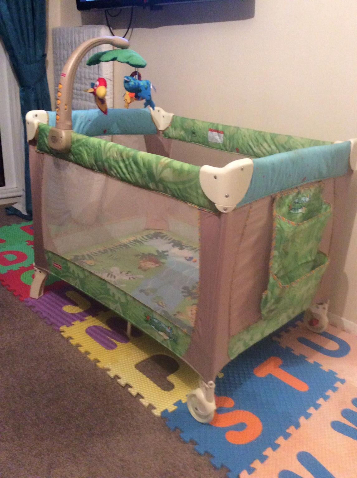 Fisher price shop rainforest travel cot