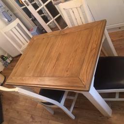 table in mint condition very clean and sturdy chairs are clean too except the damage that can be seen at the bottom .can be  taken out and put new wood in and paint over it if you are good at DIY.
please open to offers heavy wood.