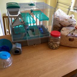 Great cage, lots of extra items, running ball, 2 partially used bags of shavings (still in perfectly good condition).
Only defect is one metal bar has come detached at top of cage (shown in photo). Duct tape worked fine for our little hamster.
No hamster included! :)
Collect only please.