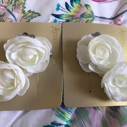 Flower hair clips from Accessorize. Never used. £4 altogether
