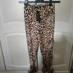 I saw it first size 8 leopard print trousers with a frill