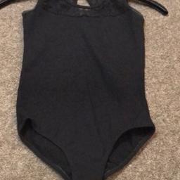 Black girls leotard. Appropriate age 12yrs. Lace front and back worn but in good condition. Slight deodorant mark under arms