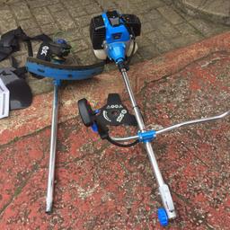 SGS petrol strimmer in good but used condition complete with trash cutter although I don’t know if all attachments are there for it now , full instructions too , used for 4 hrs or so no longer needed , 52cc