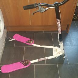 white and pink sporter scooter from smyths as seen in the pics £60 brand new . hardly used a few marks on it but like new perfect working order folds down flat so easy to take places.