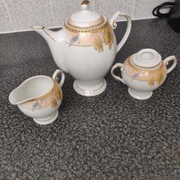 used but in good condition. includes a teapot sugar pot and a milk pourer.