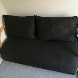 black sofa which seating folds down to become a bed. mattress/seating lie down on the floor. used only few times as guest bed. it's great for space saver. new cost £200