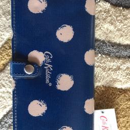 Blue polka dot oilcloth purse.
BNWT