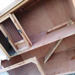 Two tier rabbit hutch only used a year have to get rid as daughters going to university the pictures don't do it justice... 60.oo ONO..