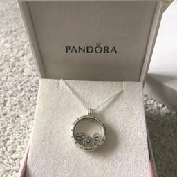Genuine Pandora Floating Large locket necklace (love&family petites new)
PANDORA jewellery and each piece has the PANDORA hallmarks 
CAN POST