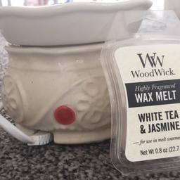 Electric wax melt warmer and brand new wood wick white tea and jasmine wax melt.