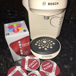 Bosch tassimo coffee machine white / cream that makes Costa coffee drinks in your home. Perfect condition hardly used and very easy to use. I have two boxes of pods that come with it too that I will give with the machine. Original instructions do come with coffee machine but not original box. Collection only.