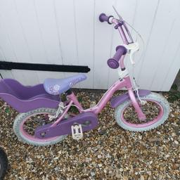 lovely little pinks and purple bike. complete with baby carrier. some signs of wear but ideal for summer . collection West heath B38