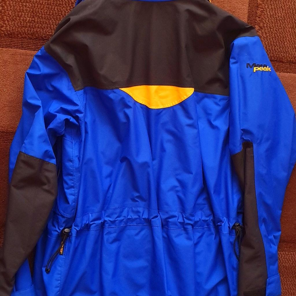 Berghaus mera peak shop blue and yellow