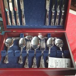 A 34 piece of immaculate cutlery, Sheffield stainless steel, comes in a wooden box. Made by Arthur price of England. Collection only.
