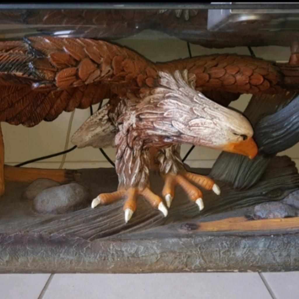 Eagle coffee table with rounded glass top in M13 Manchester for £50.00