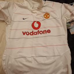 Large mens Man Utd away shirt from 2003 - it has a bit of wear on the transfer on the front but otherwise in good condition.