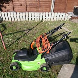 challenge lawn mower in used condition  but perfect working order comes complete with  collection  box