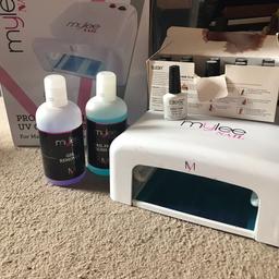 Mylee uv gel nail lamp with 11 gel nail varnishes(some used), gel remover, nail prep and cotton pads.