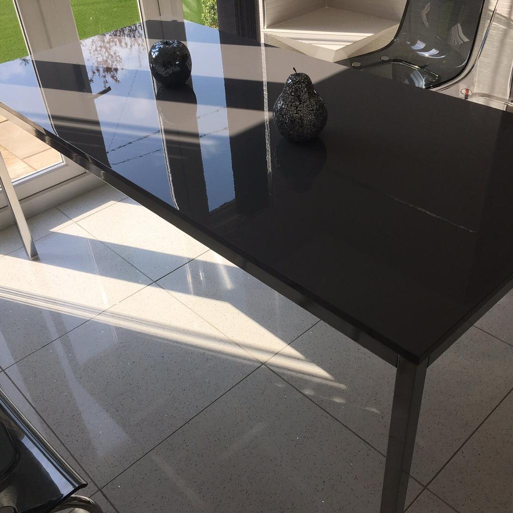 NEW REDUCED PRICE!
Stylish dark grey with chrome legs table.
Good condition.
Comfortably sits 6 with 3 each side.
Measures 180cm length and 85cm width.
Chairs NOT included. Pick up only.