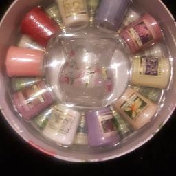 COLLECTION ONLY NO POSTING.

Gift never used. Contains 20 scented votives and 1 votive holder, presented in a pretty round floral box with pink ribbon.
£10 No offers.