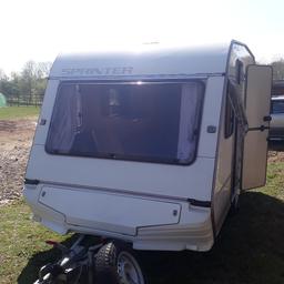 Selling as we have only used it once. It has an awning and has a caravan cover too. Brand new curtains added. Kept in storage for nearly 10 years. Collection within 1 week of sale. Awning is 7.70m. Chassis is all sreel tapered section frame with hexagonal tibe rubber suspension. Spare tyre included. Overall height is 2.46m. 2 double fold out beds. Please message if you have  any questions. 