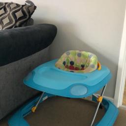 Blue baby walker 
In a used condition but plenty of life left