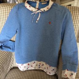 Lovely jumper with attached cuffs and collar but detachable bow. Selling as it no longer fits my daughter.Please see my other items.
