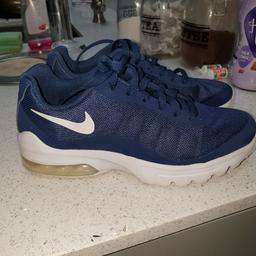 Navy blue Nike trainers size 4. Worn about half a dozen times. Excellent condition.