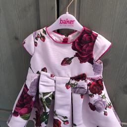Beautiful ted Baker dress comes with frilly pants (never worn) the dress was worn once just like brand new!