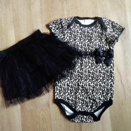 So gut wie nie getragenes Body-Set im angesagtem Leopardenlook. Body + Tüllrock mit Gummizug + Haarband! Versand 1,45€