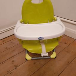Fold up baby high chair that can be strapped up to a normal chair if you are eating at a dining table.