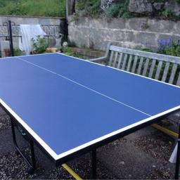 Debut Table tennis table 206 cms. Length X 116 cms width
Folds in half for storage on casters
Light wear n tear on centre edges but doesn't affect play