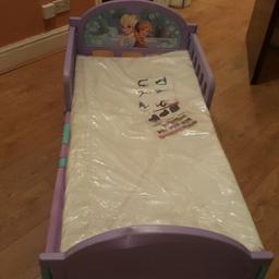 KIDS FROZEN PLASTIC BED WITH MATTRESS STILL GOT SEAL ON IT IDEAL FOR YOUNG TODDLER USED BUT DECENT ENOUGHMATTRESS WAS PURCHASED FEW MONTHS AGO