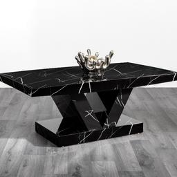 This Soni marble effect coffee table features a thick solid top and base, The table has been finished off with a contrasting Brown high gloss V shaped base, stabilized by a single MDF foot.The top has been coated with a protective finish and hand polished to a beautiful shine. The impressive weight of the items in this range are a sign of their quality and will last for years to come.

Material :
MDF with high gloss finishing

Dimensions :

L120 X W65 X H45CM

Colour: 
Brown & Cream
Black & White
All Black 

Deliver charges may apply.