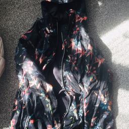 Girls floral mac coat perfect condition age 11-12 collection only from Chelmsley Wood.