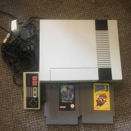 1st Nintendo Very good cosmetic and working condition . 1 controller with 2 games super mario 3 and isolated warrior
