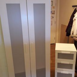 in good used condition. does show age related marks. there is some damage on the back part of the wardrobe panel as pictured and also small damage to the side of the cabinet. All marks etc doesn't effect use and both are sturdy and ready to go.