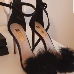 black fluffy heels size 6 very comfortable. collection from b14