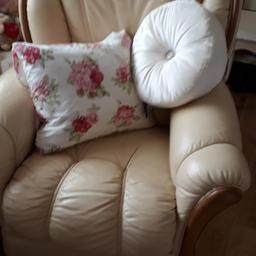 small cream leather armchair.