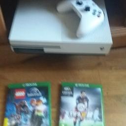 Xbox one s 500GB still in box. 1 wireless controller, 2 games -fifa 16 and Lego Jurassic world. connects to Wi-Fi and plays blue rays. only had it for 6 weeks