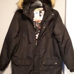 Girls Coat in Perfect Condition. 
Coat with fur hood. Padded lining with pockets on both sides, plus two at the top.
This coat is ideal for a school coat.
Collection only